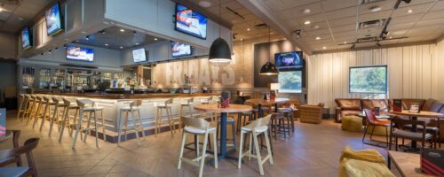 Interior photography of a restaurant, seating setup and food counter