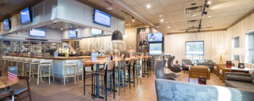Interior photography of a restaurant, seating setup and food counter