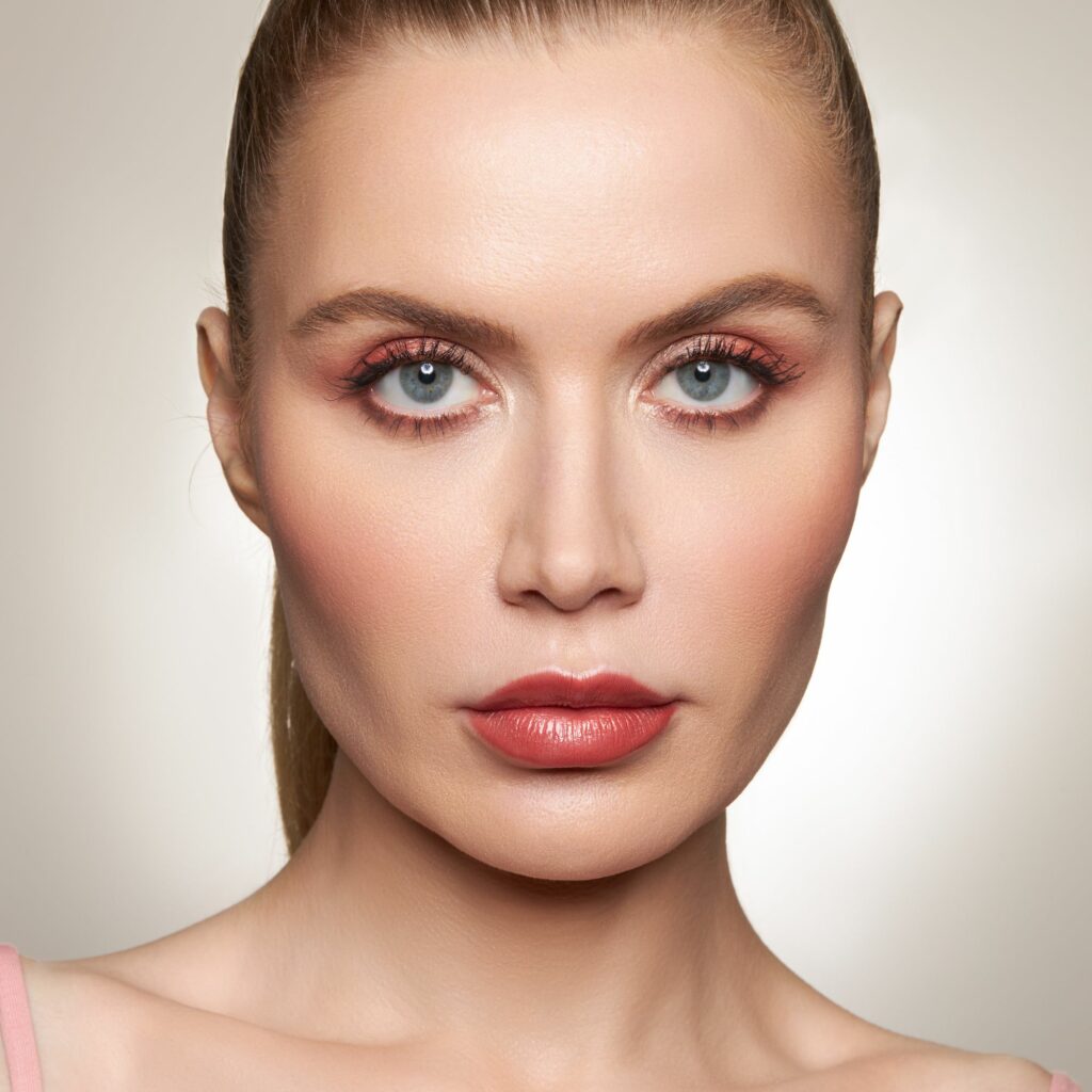 Model headshot photography with female model wearing light pink lipstick by Isa Aydin nj ny la