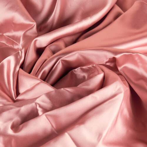 Pink color creative material props on a lay-flat angle by Isa Aydin nj ny la