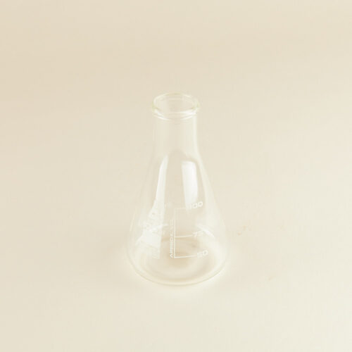 Lab glass baker prop photoshoot on a beige background by Isa Aydin nj ny la