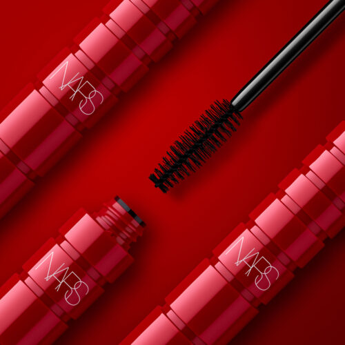 Professional cosmetics red color mascara on a red background shoot by Isa Aydin NJ NY LA